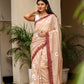 Elegant Stylera malmal saree with designer border in soft beige and floral embroidery. Perfect for special occasions.