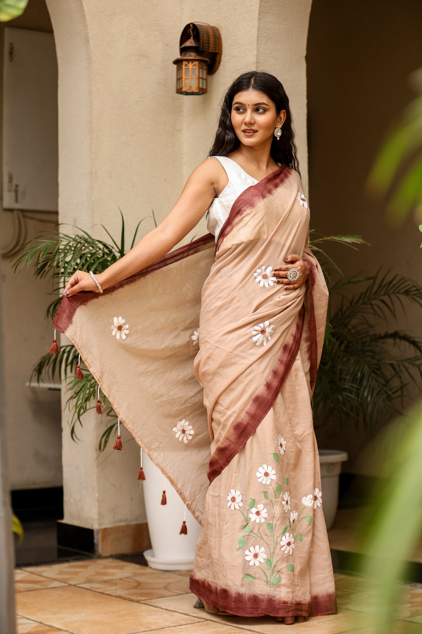 Stylera Malmal Saree with Designer Border, featuring elegant floral embroidery and rich colors to buy malmal saree with designer border