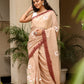 Elegant Stylera malmal saree with designer border, featuring floral embroidery and a soft beige color