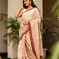 Stylera malmal saree with designer border in soft beige featuring floral embroidery, perfect for elegant occasions. Buy malmal saree with designer border.