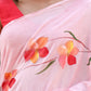 Buy trendy malmal saree in soft pink with floral patterns for elegant style and comfort