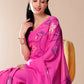 Model wearing Calm Canvas floral saree in vibrant pink with floral designs for traditional elegance