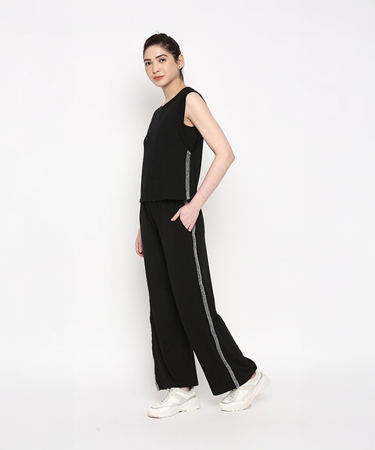 Stylera casual black pants and top set featuring a relaxed fit and side stripe detail