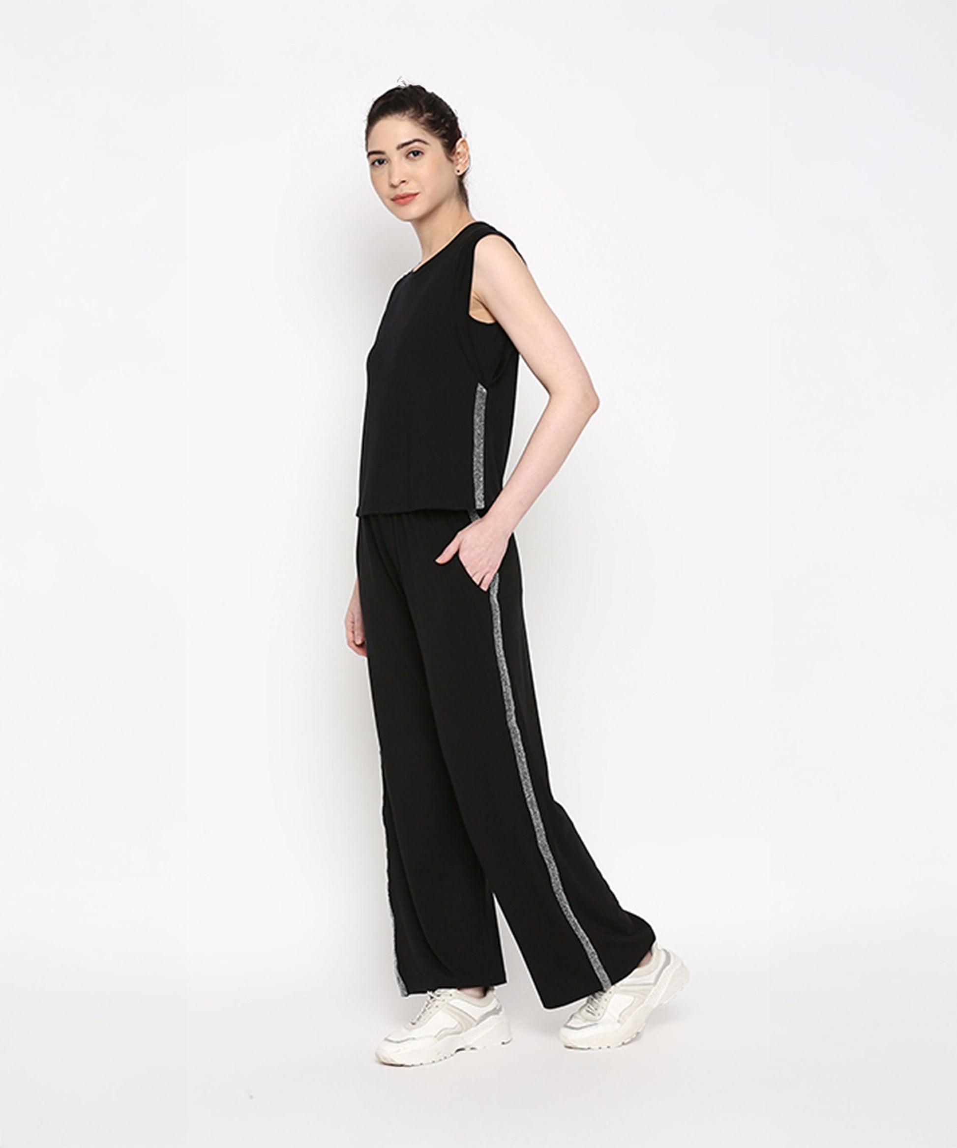 Stylera casual black pants and top set featuring a relaxed fit and side stripe detail