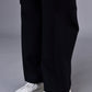 Stylera casual black trousers for women straight wide leg full length shown with white platform sneakers