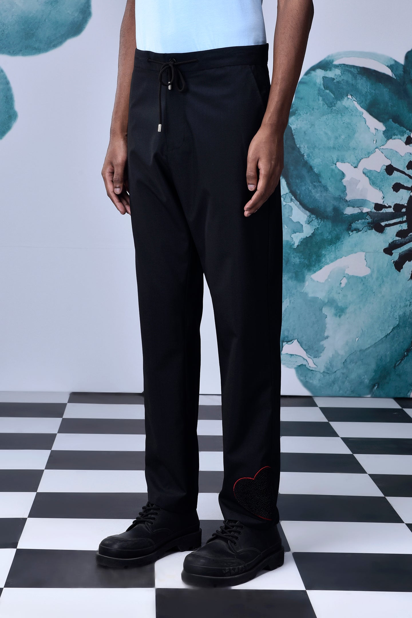 Casual black wool trousers by Stylera with drawstring waist and relaxed fit