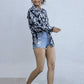 Stylera casual boho shirt for women paired with denim shorts and sneakers for a trendy look