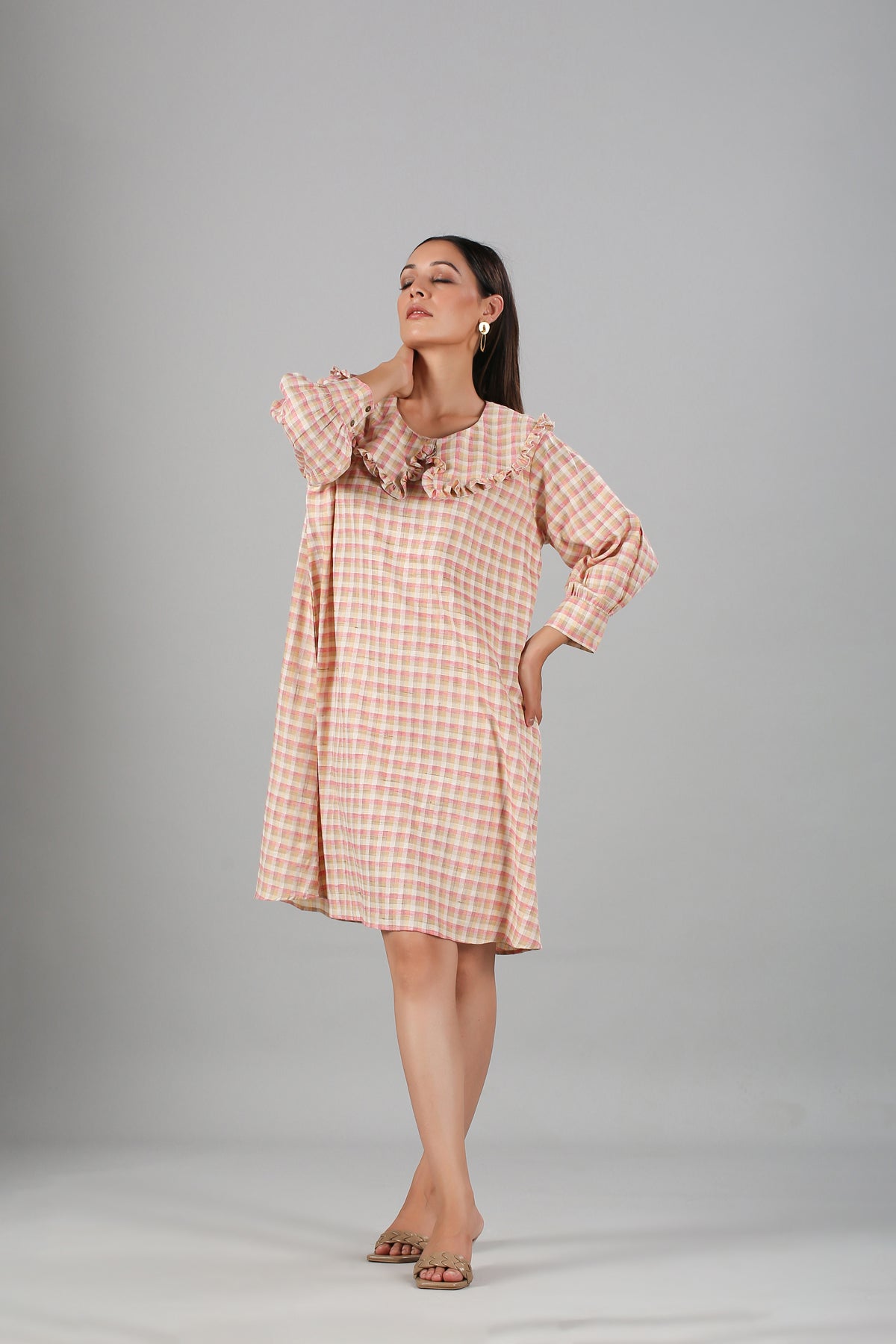 Stylish casual checkered dress for women with ruffle detailing and long puff sleeves
