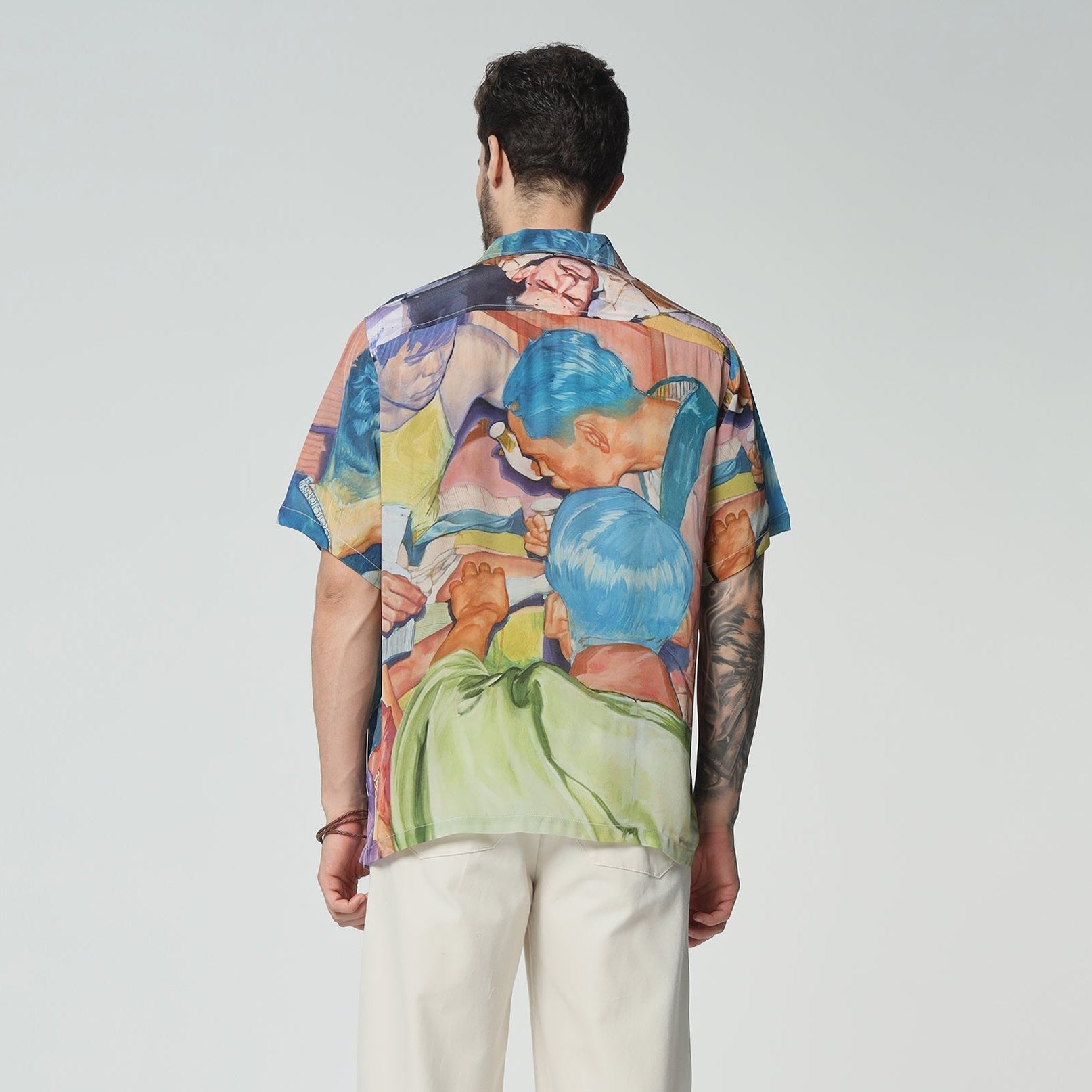 Stylera colorful casual fashion shirts for men featuring a vibrant artistic design on the back