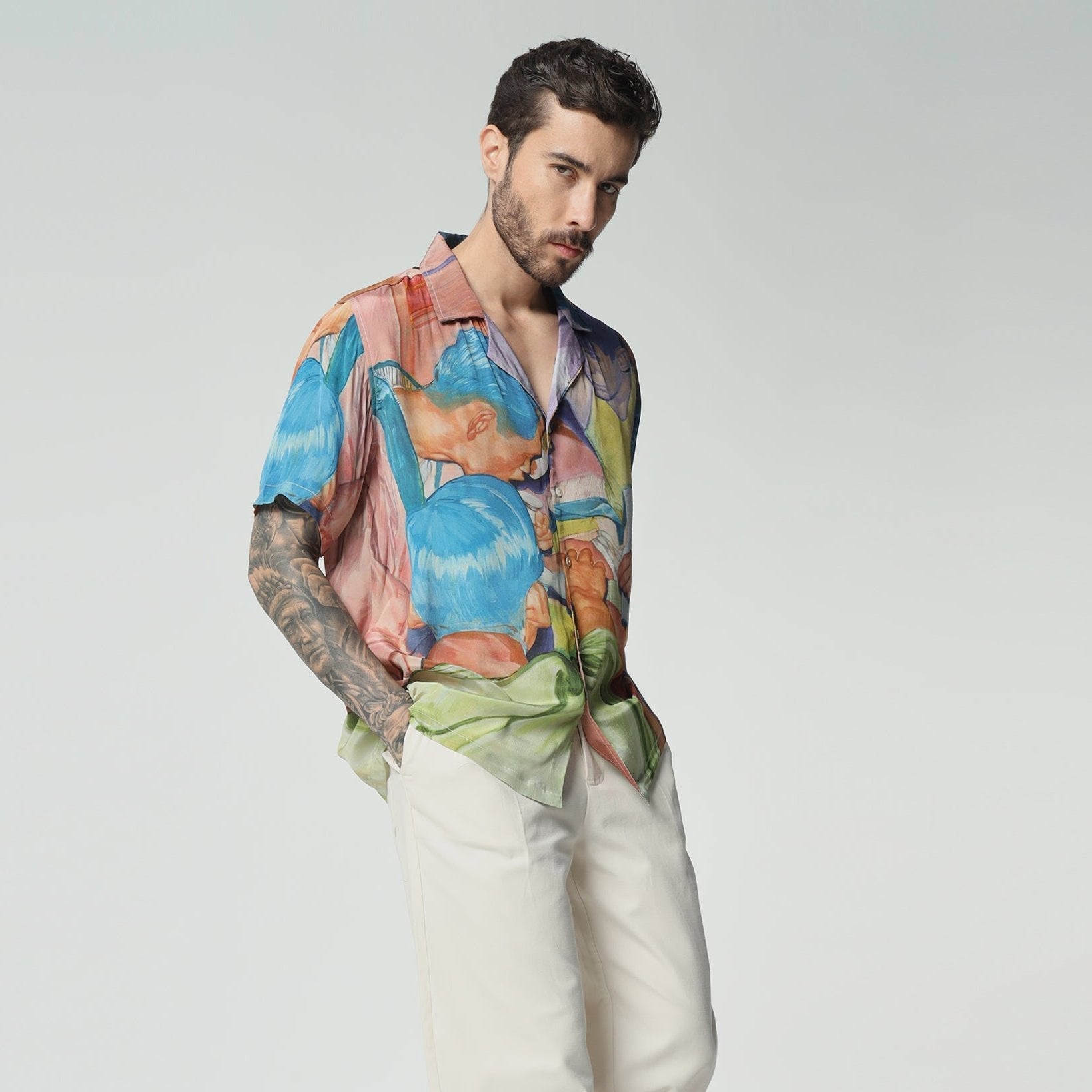 Stylera casual fashion shirts for men featuring a colorful tropical print, perfect for summer outings.