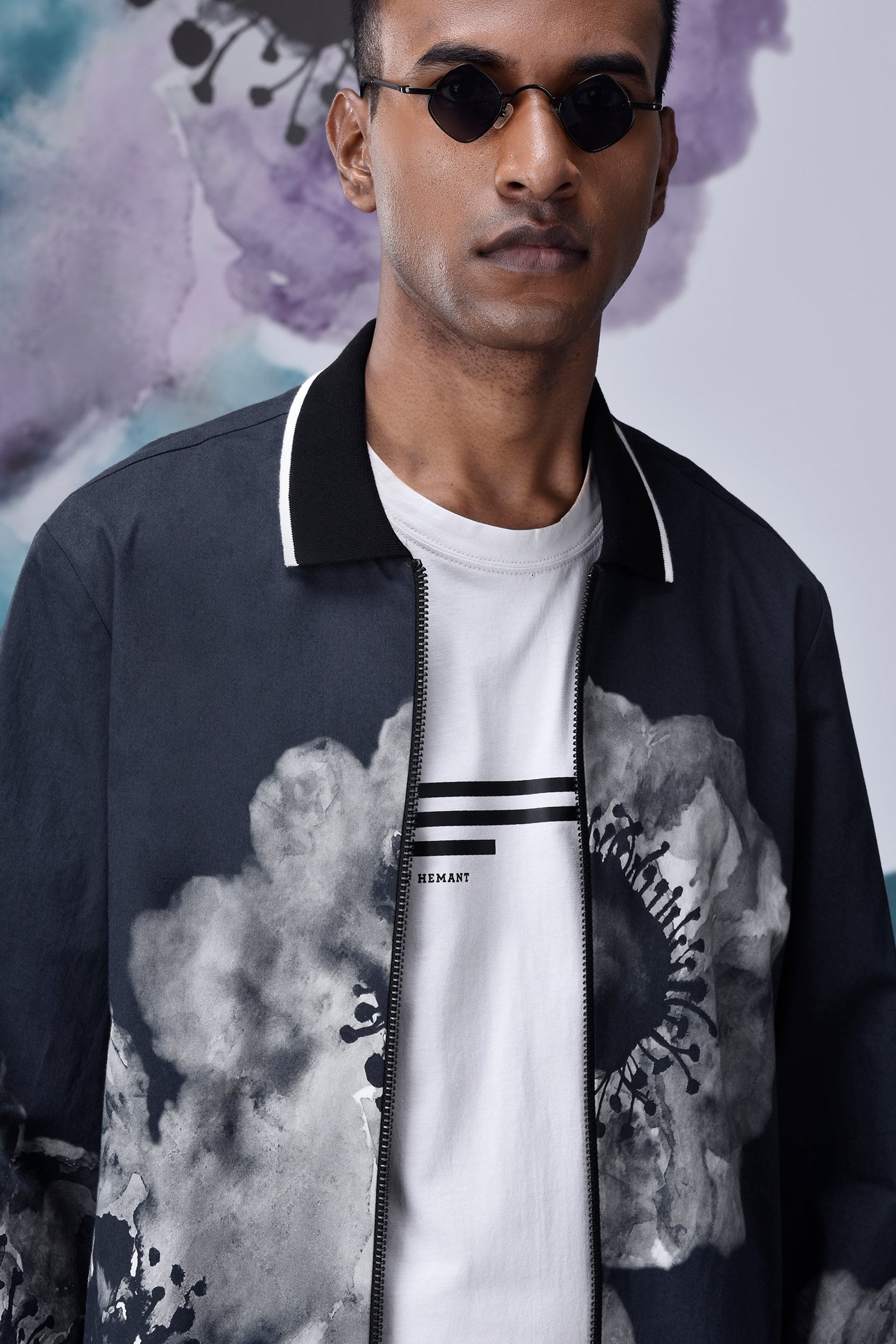 Stylera casual flower patterned zip jacket on male model in sunglasses with white tee
