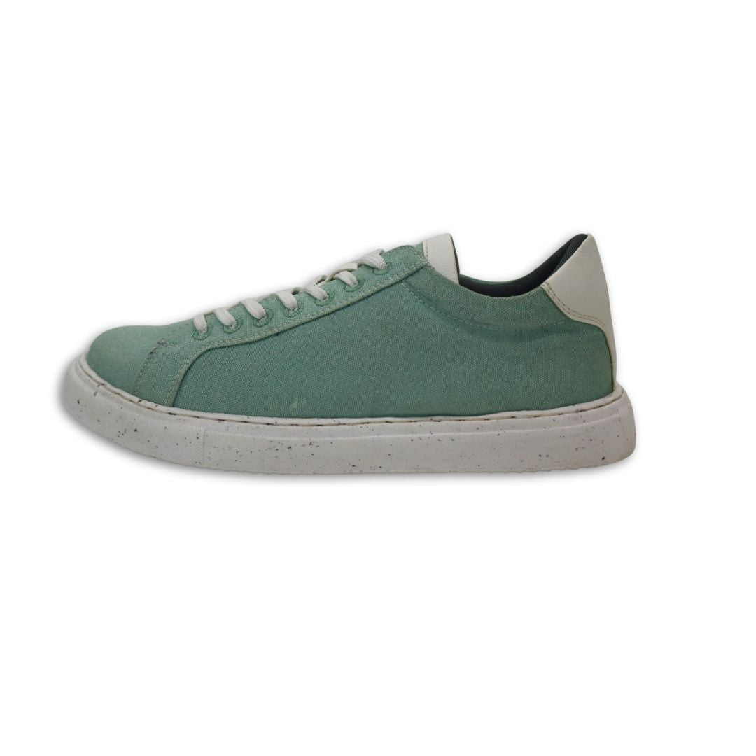 Stylish casual green sneakers for women with a minimalist design and comfortable fit