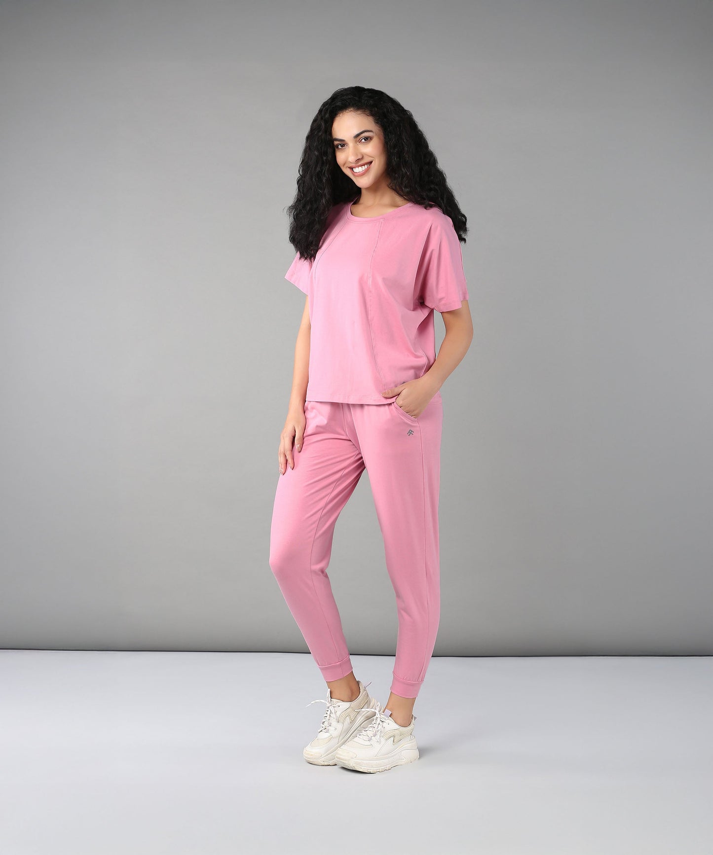Stylera Casual Pink Lounge Wear for Women featuring a comfortable top and pants design