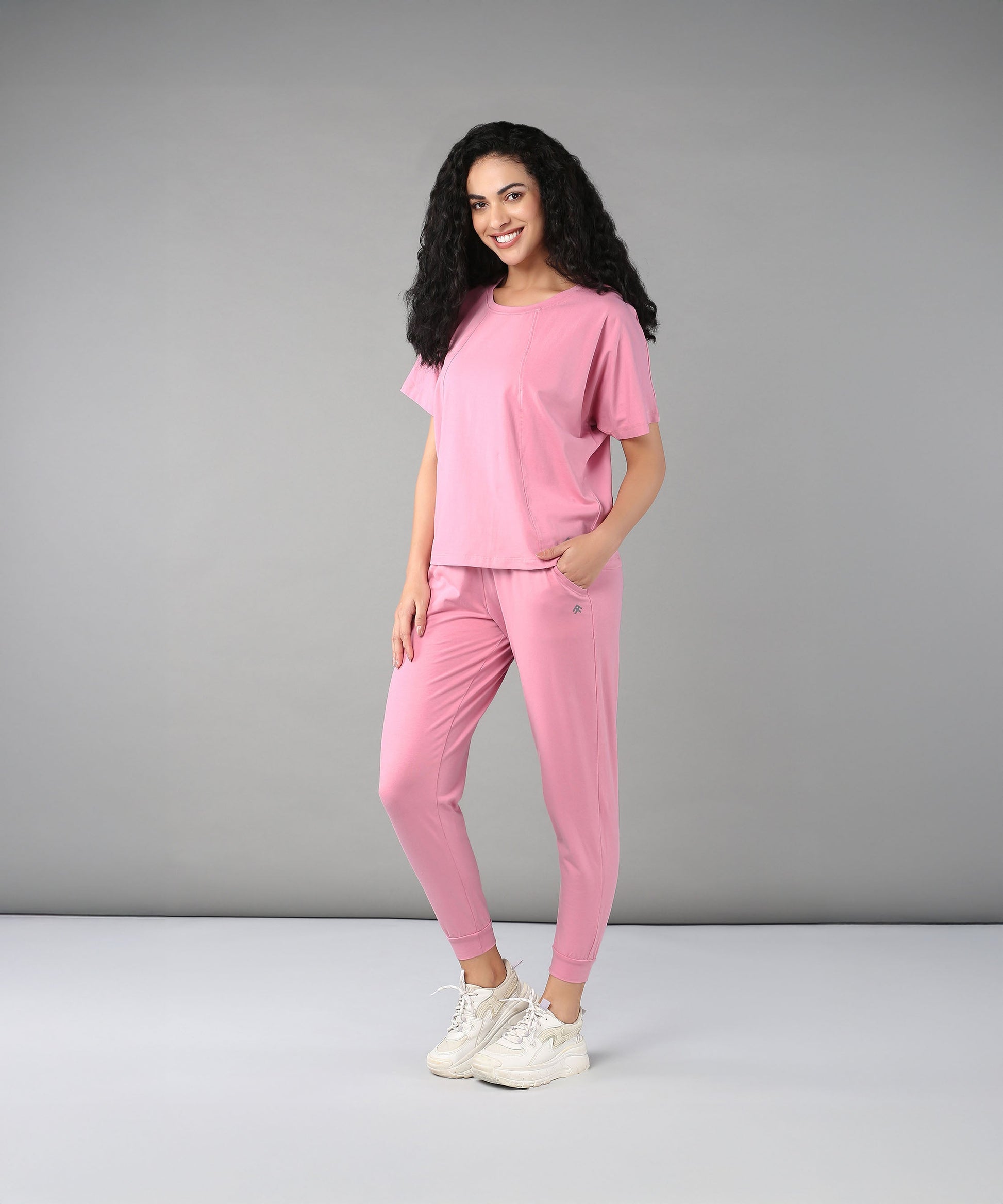 Stylera Casual Pink Lounge Wear for Women featuring a comfortable top and pants design