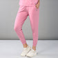 Comfortable casual pink lounge wear for women featuring a stylish top and fitted pants