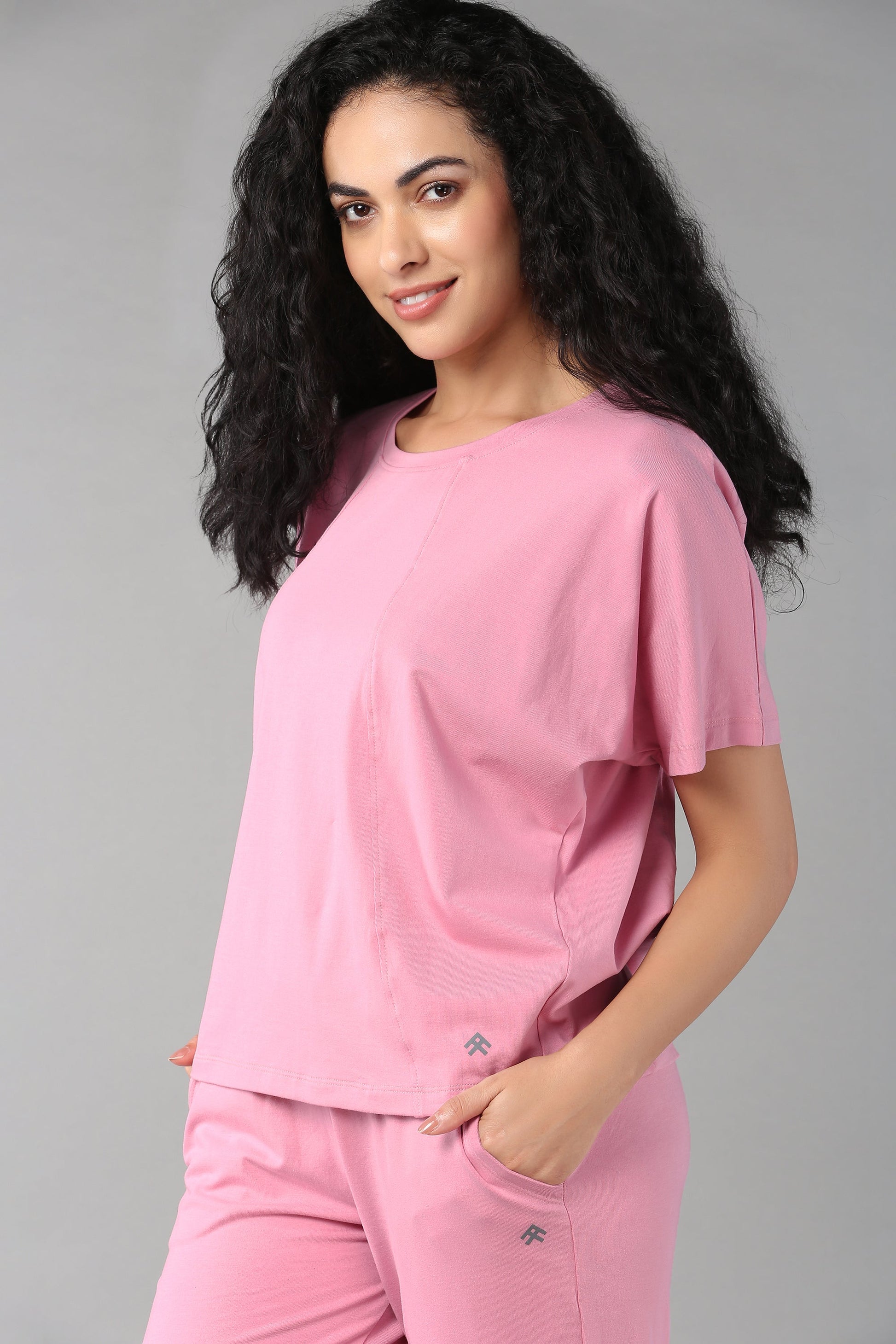 Stylera casual pink lounge wear for women featuring a comfortable short sleeve top and matching pants
