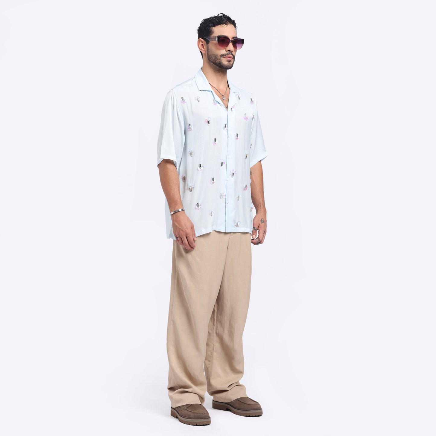 Stylera light blue short sleeve shirt featuring a playful design, perfect for casual short sleeve shirts for men