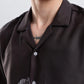 Stylera black camp collar shirt with striped graphic front and white buttons on male model casual statement shirts for men