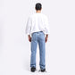 Back view of Stylera casual streetwear t-shirt paired with relaxed blue jeans for a trendy look