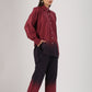 Model wearing a casual two-piece ombre outfit in burgundy and dark purple tones, featuring a button-up shirt and matching pants.