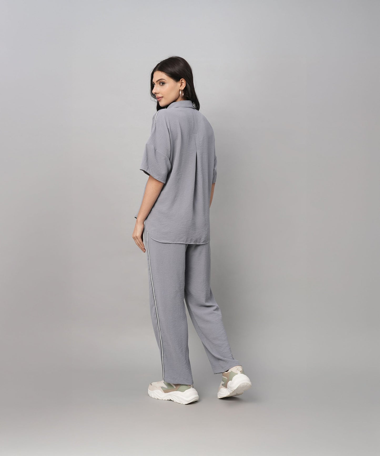 Women wearing a comfortable gray casual two piece outfit for women with a relaxed fit and elastic waistband