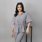Gray casual two piece outfit for women featuring a button-up top and matching pants