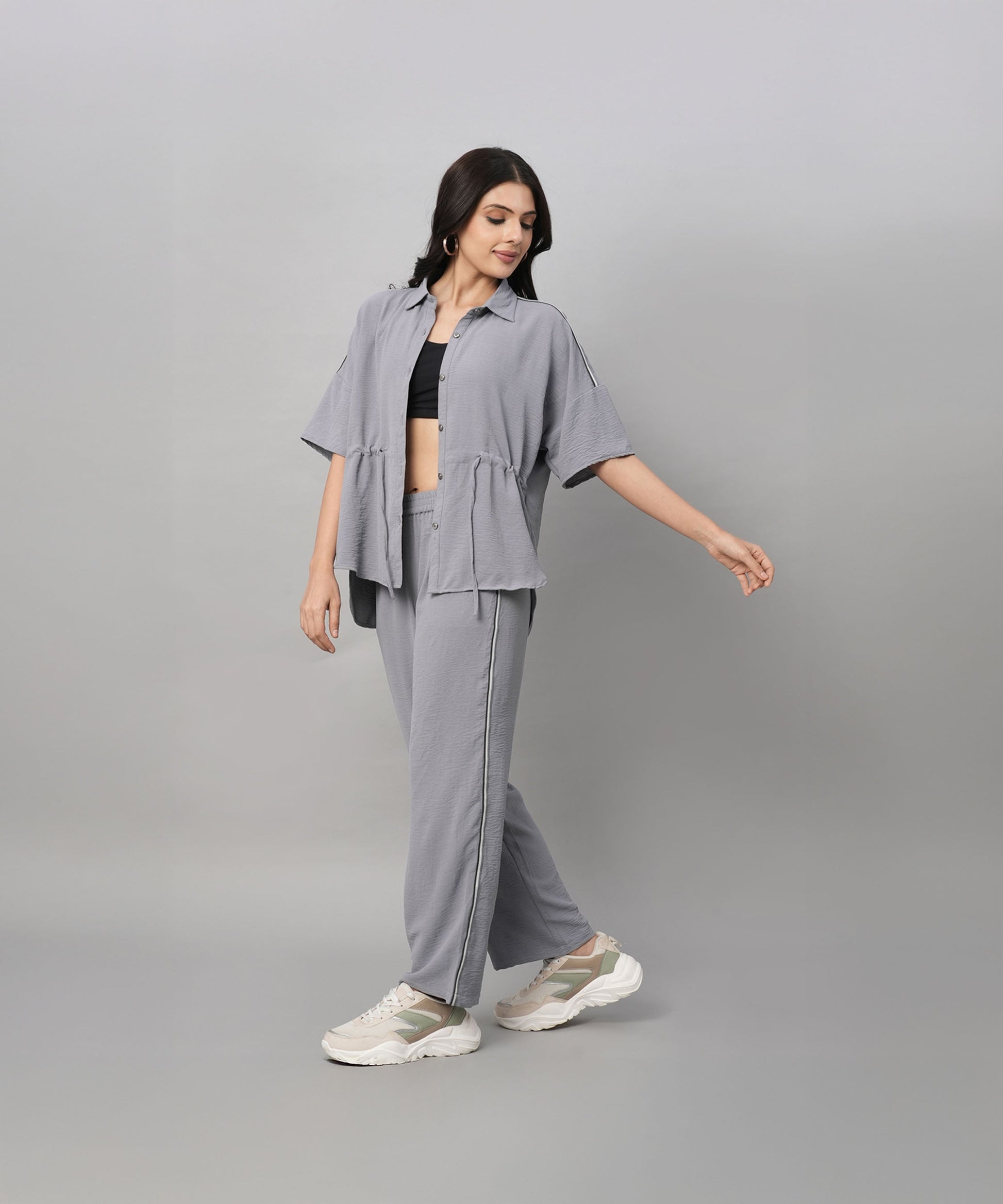 Stylish gray casual two piece outfit for women featuring a short-sleeve top and matching pants
