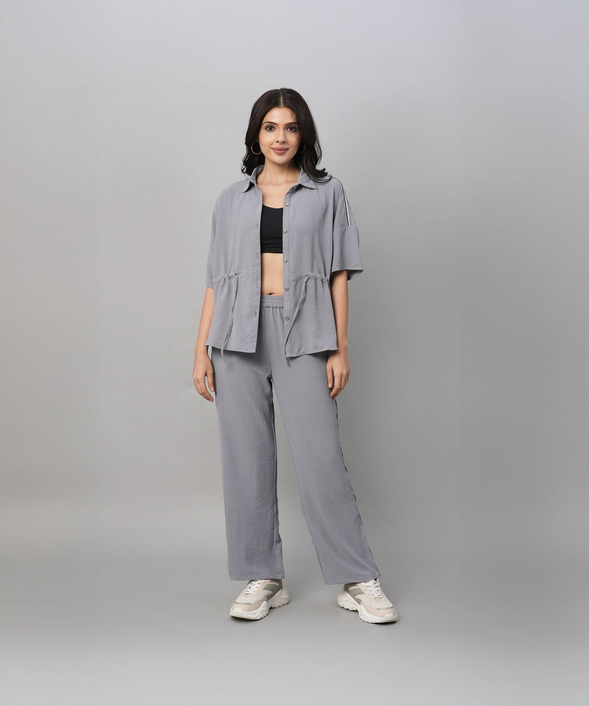 Stylish gray casual two piece outfit for women featuring a relaxed shirt and wide-leg pants