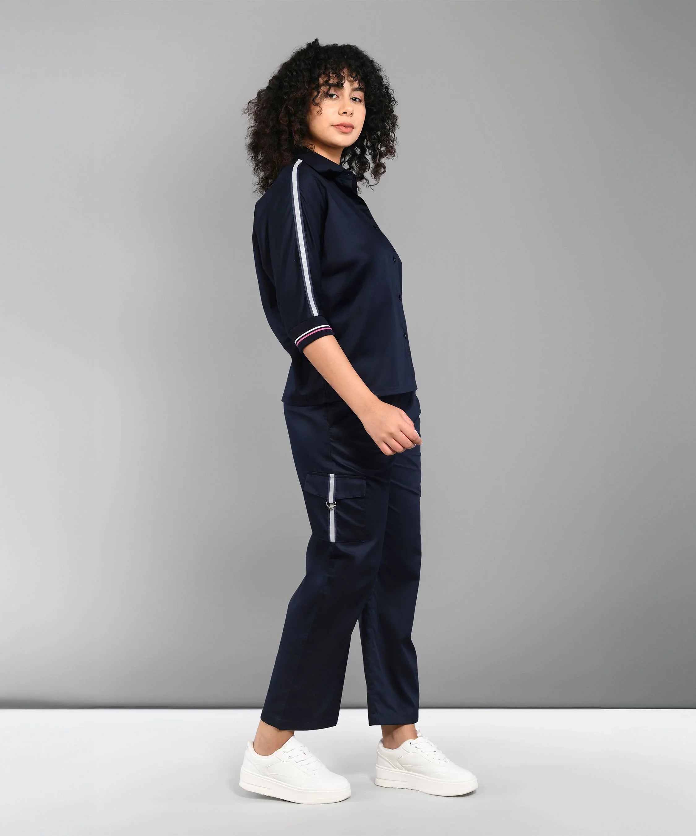 Casual women's matching set navy featuring a stylish top and pants with modern details