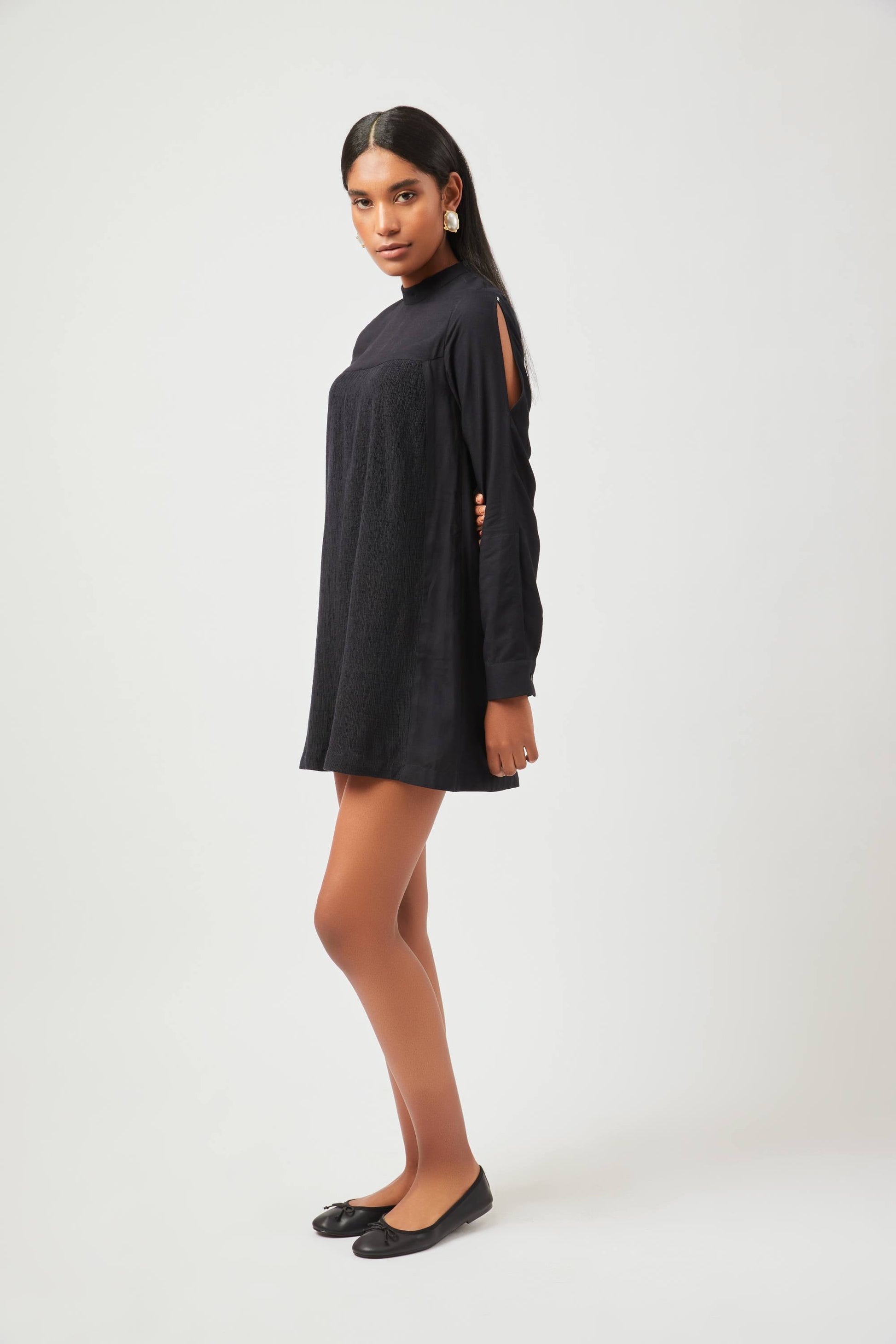 Stylera chic little black dress with long sleeves and cutout detail styled with black flats