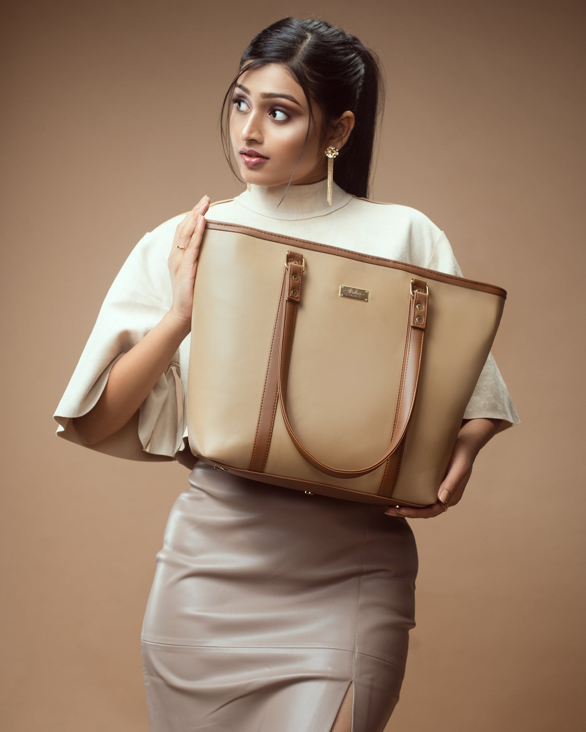 Stylish cinnamon cocoa tote bag held by a woman in a neutral outfit, perfect for everyday use