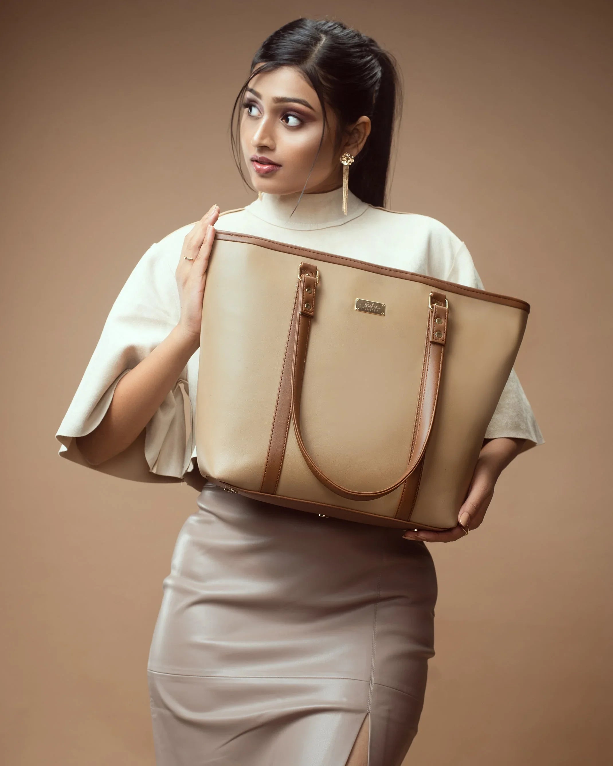 Stylish cinnamon cocoa tote bag held by a woman in a neutral outfit, perfect for everyday use