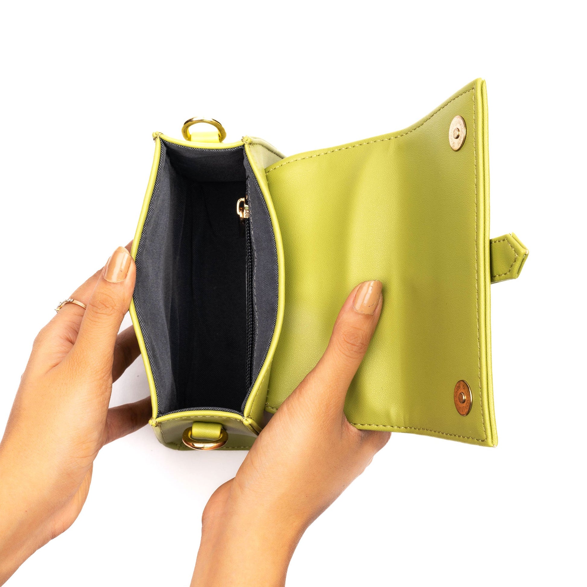 Open Stylera citrus color shoulder bag showcasing interior and stylish design