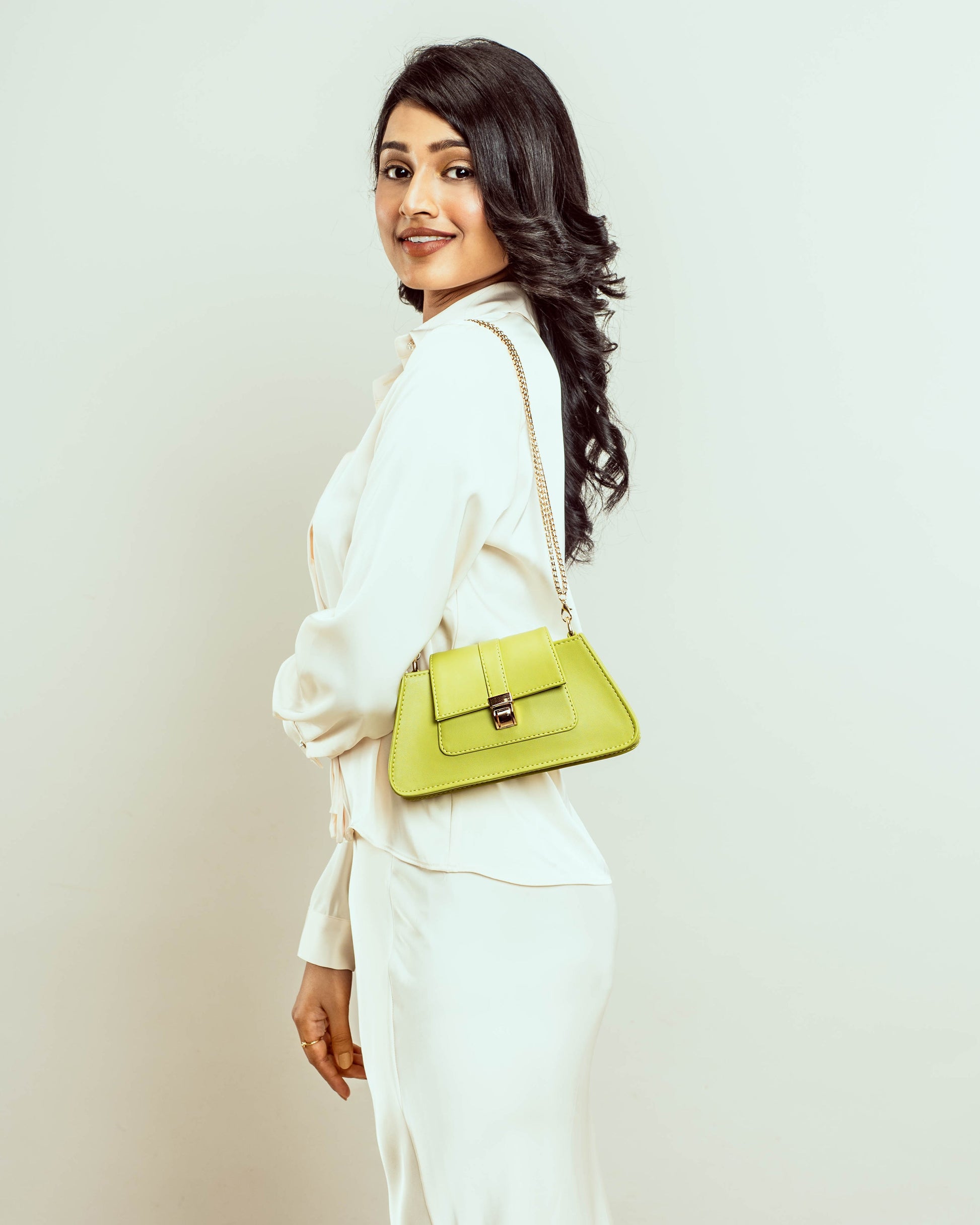 Citrus mini baguette bag in bright green, perfect for stylish outings and accessorizing outfits