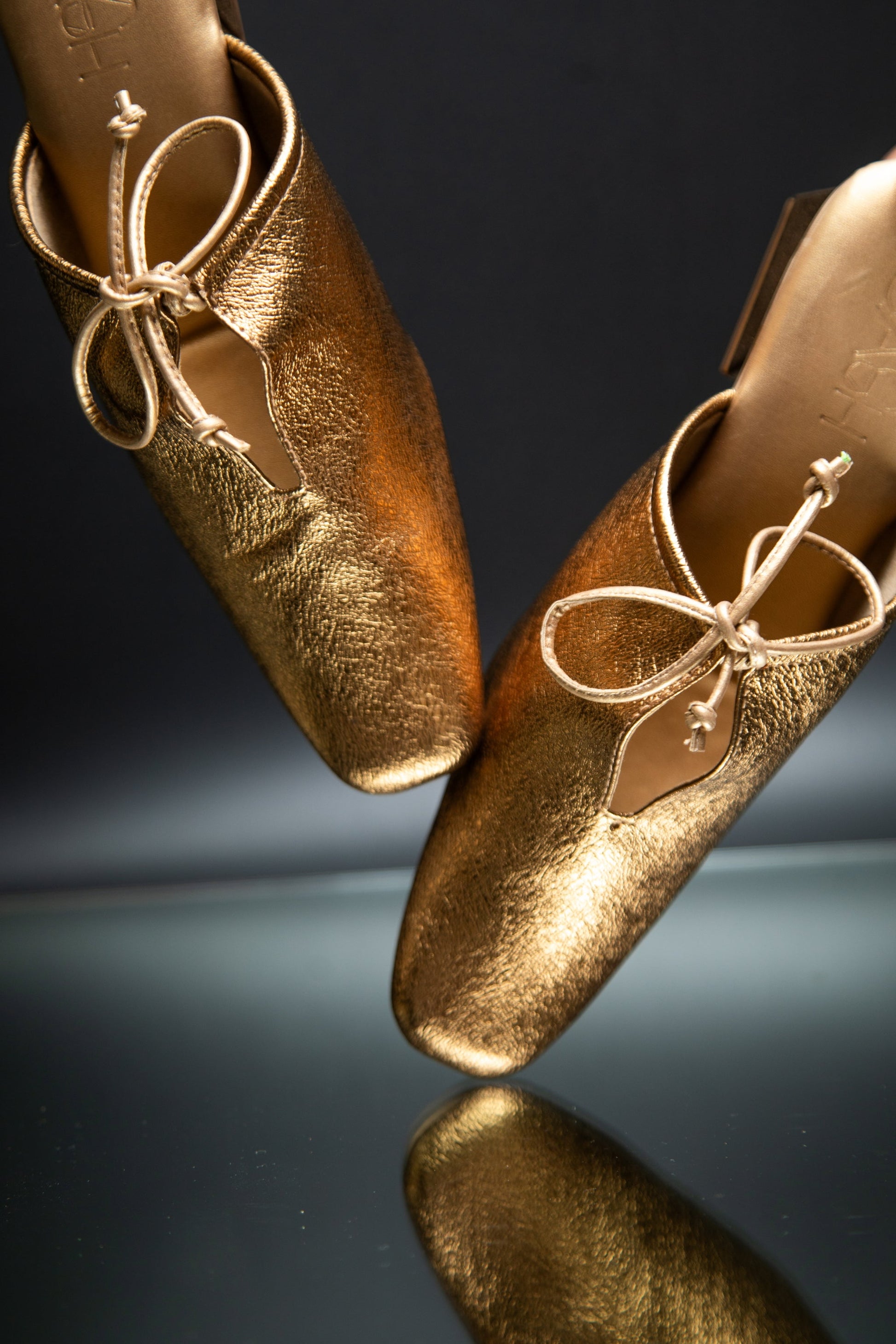 Gold metallic heels by Sash Stylera, trendy slip-on shoes for women with bow detail