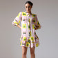Stylera colorful casual day dress for women featuring a playful print and ruffled hem
