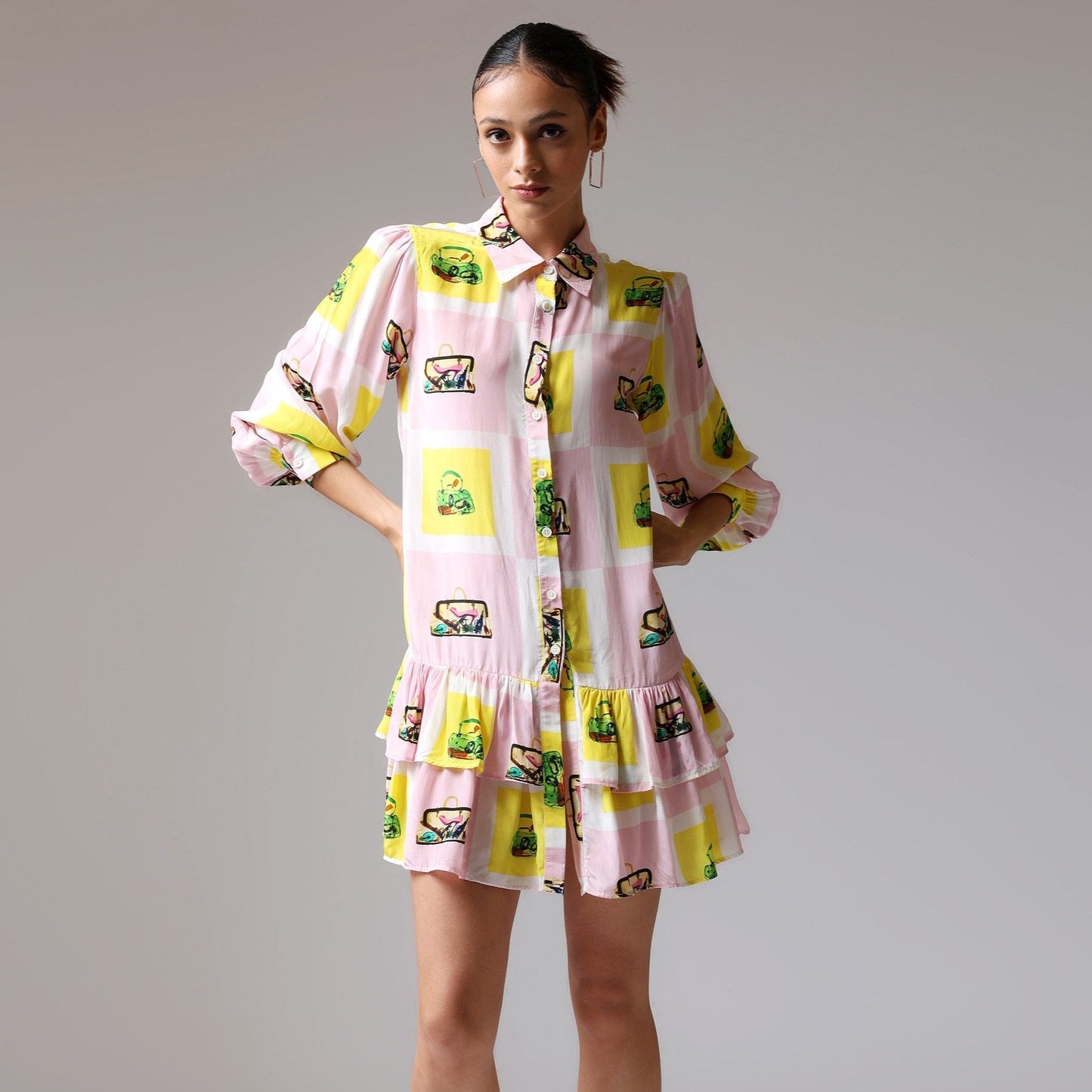 Stylera colorful casual day dress for women featuring a playful print and ruffled hem
