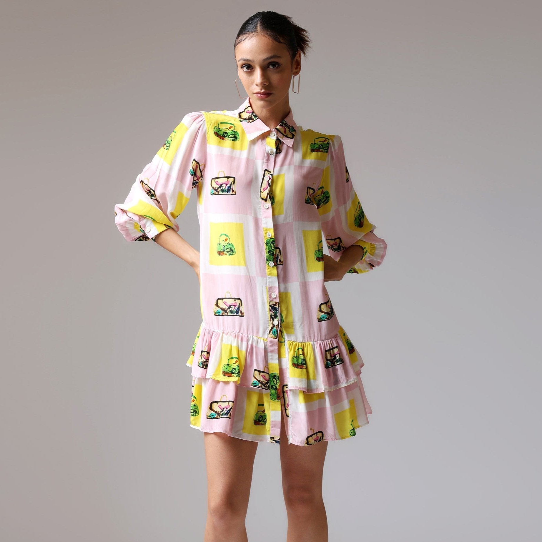 Stylera colorful casual day dress for women featuring a playful print and ruffled hem