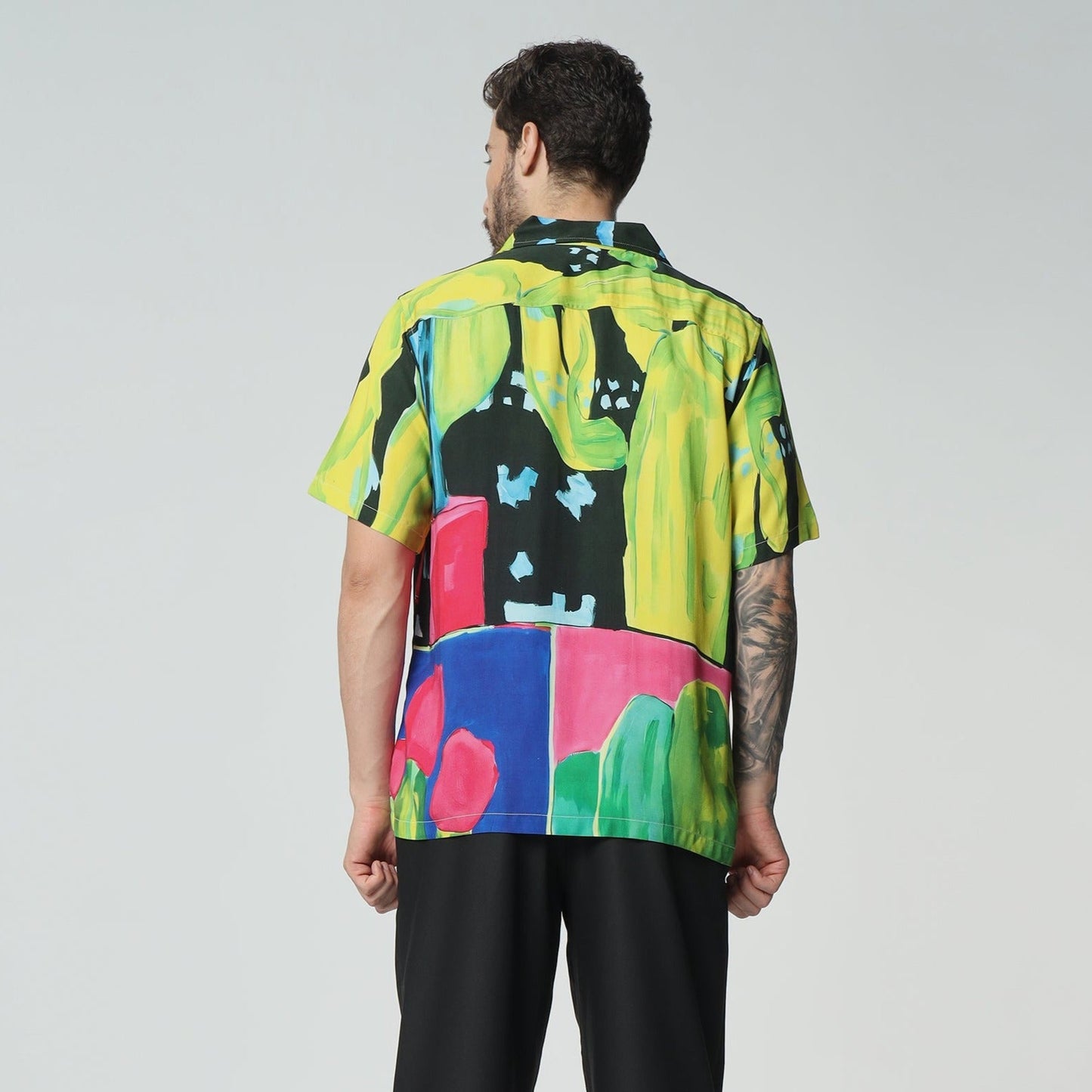 Stylera colorful graphic button-up shirt with vibrant abstract patterns and a relaxed fit