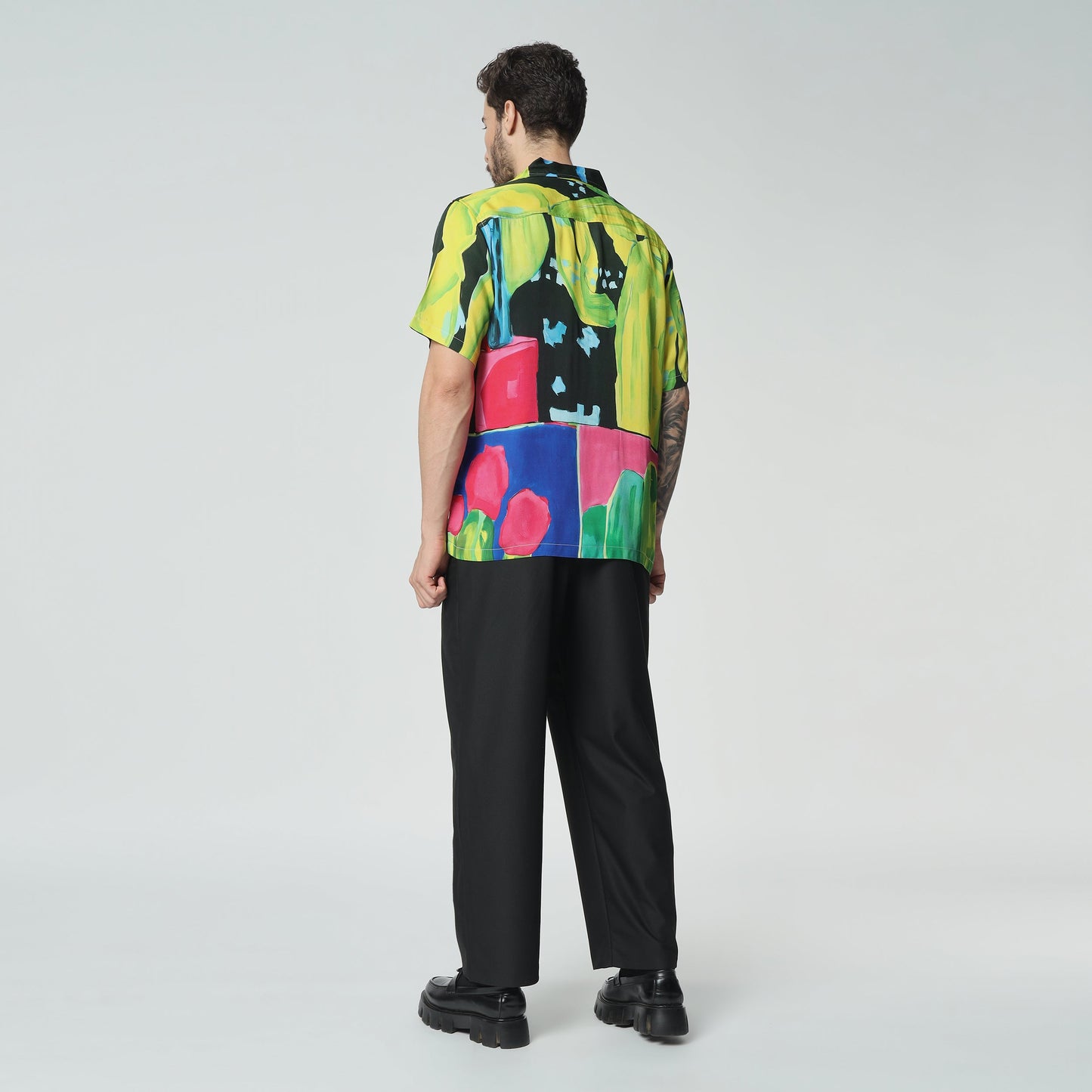 Stylera colorful graphic button-up shirt featuring vibrant colors and artistic design for a bold look