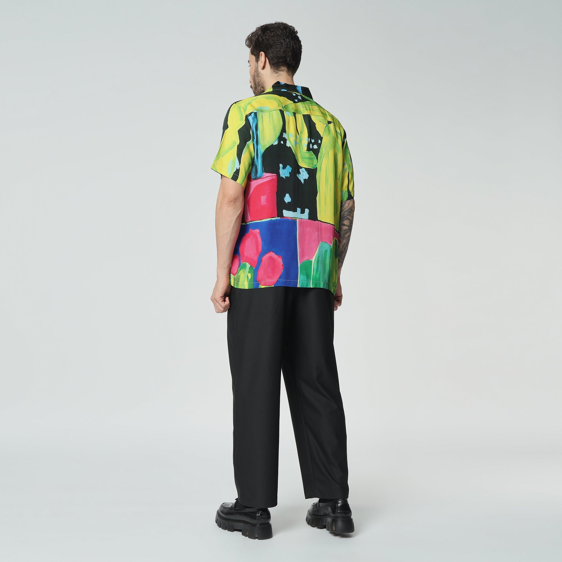 Stylera colorful graphic button-up shirt featuring vibrant colors and artistic design for a bold look