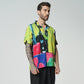 Stylera colorful graphic button-up shirt featuring vibrant colors and bold abstract patterns