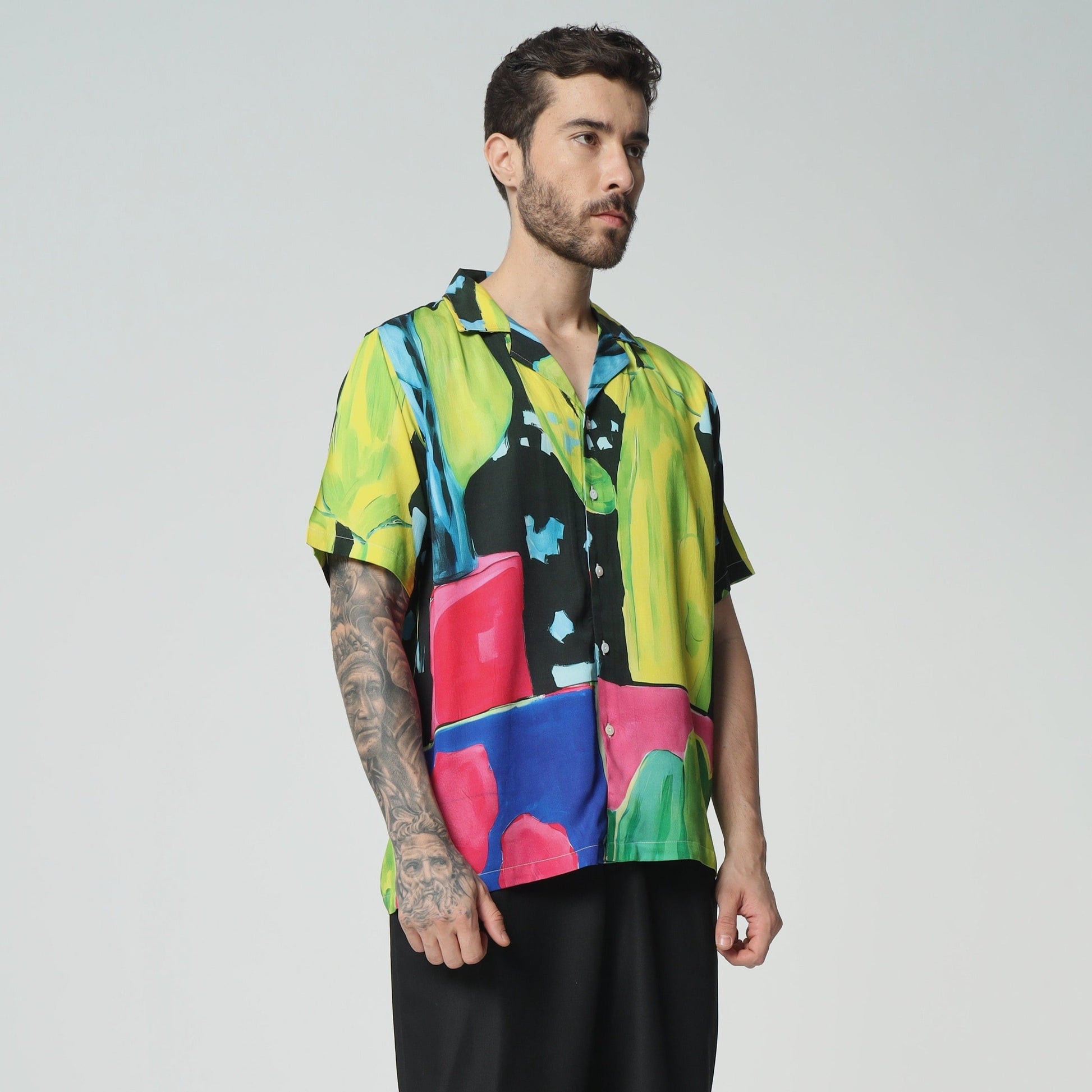 Stylera colorful graphic button-up shirt featuring vibrant colors and bold abstract patterns