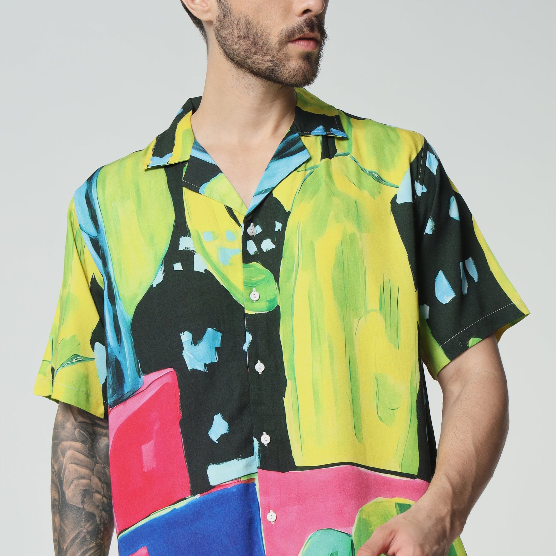 Colorful graphic button-up shirt by Stylera featuring a vibrant abstract design