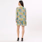 Back view of Stylera colorful long sleeve casual dress with tiered ruffles and vibrant patterns