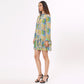 Colorful long sleeve casual dress from Stylera featuring a ruffled hem and vibrant print