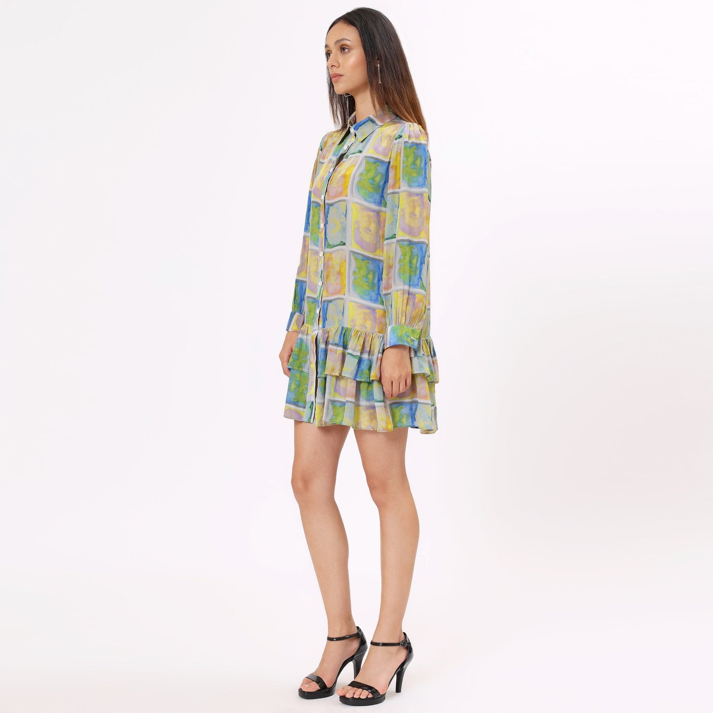 Colorful long sleeve casual dress from Stylera featuring a ruffled hem and vibrant print