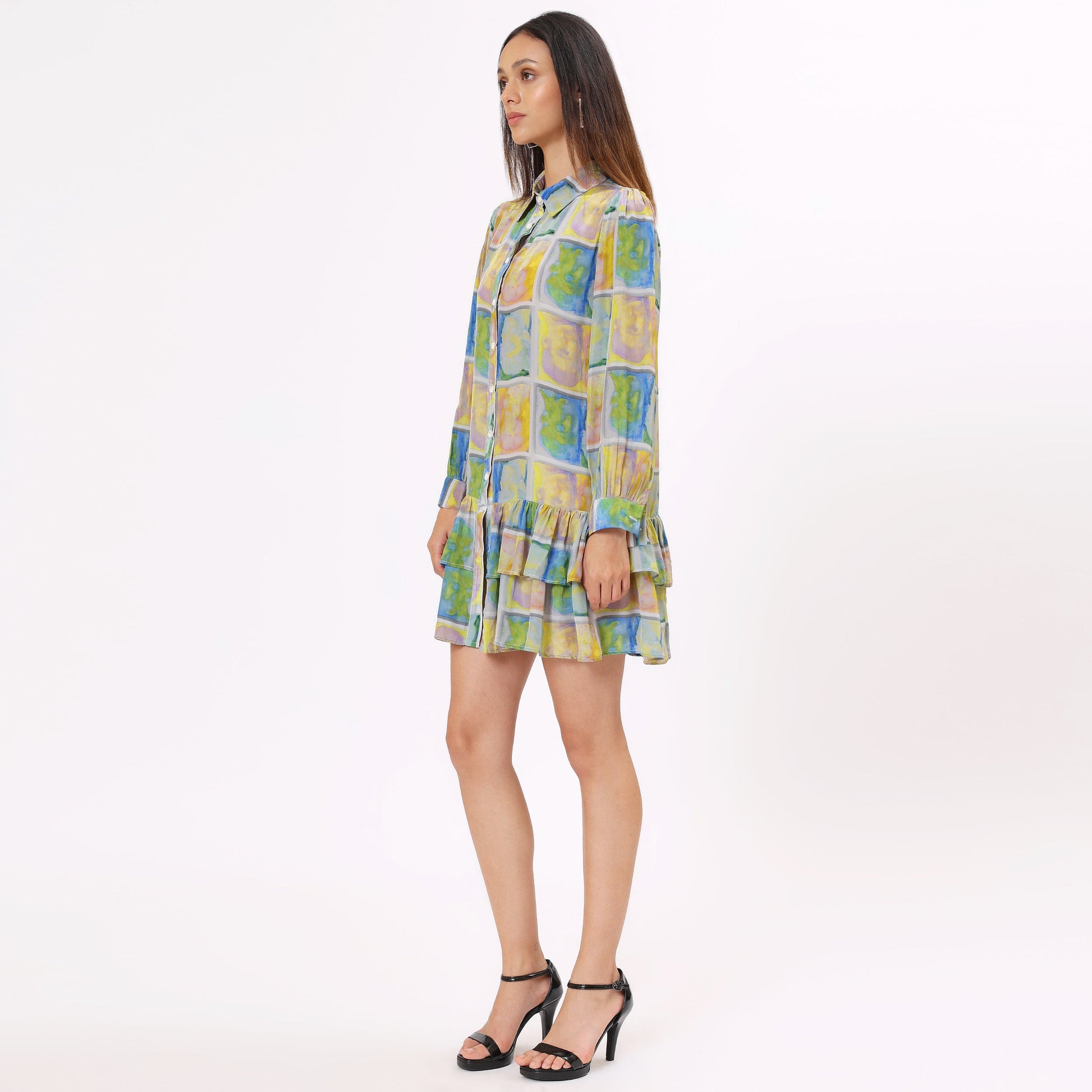 Colorful long sleeve casual dress from Stylera featuring a ruffled hem and vibrant print
