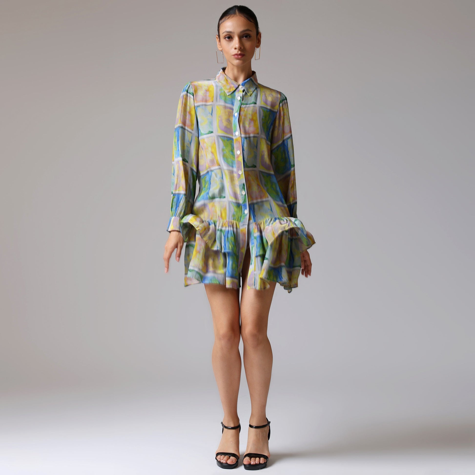 Colorful long sleeve casual dress by Stylera featuring a stylish checkered pattern and ruffled hem