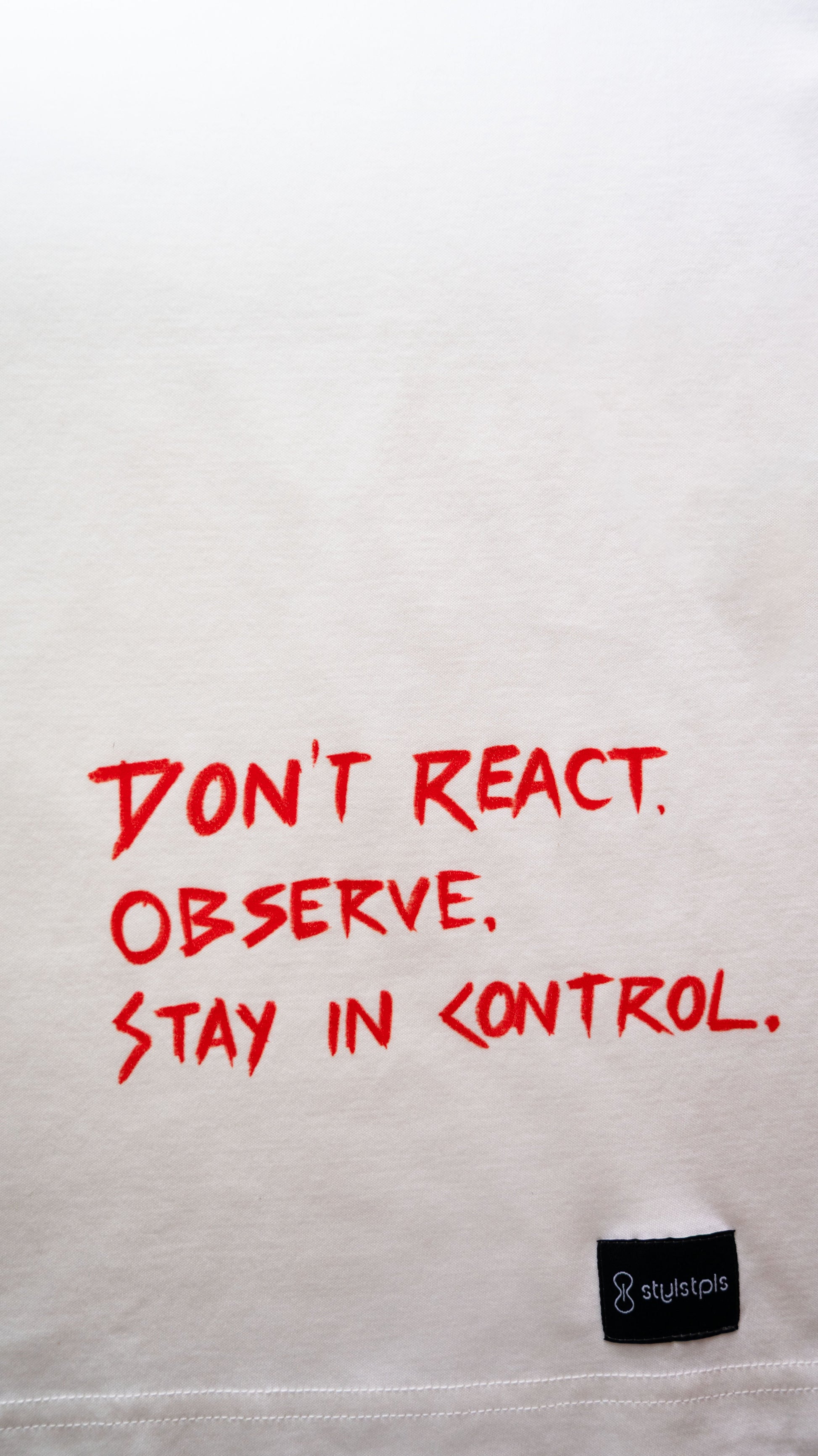 Stylstpls colorful print streetwear t-shirt with bold red text: Don't React, Observe, Stay in Control